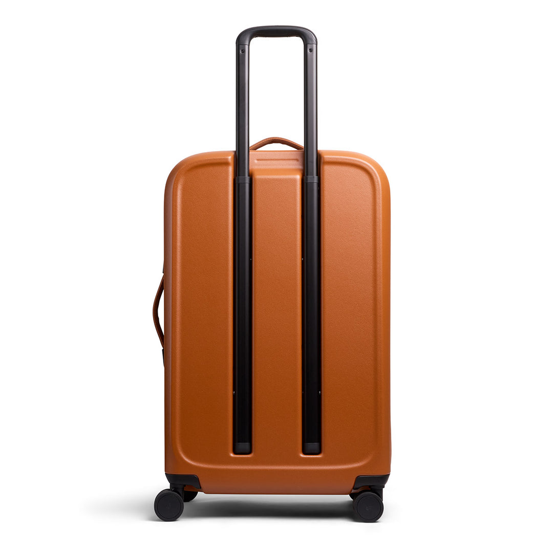 Transit Check-In Large - Bronze